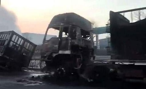 This video grab from China Central Television (CCTV) video footage released on November 28, 2018 shows burnt vehicles after an explosion near a chemical factory in Zhangjiakou. | AFP