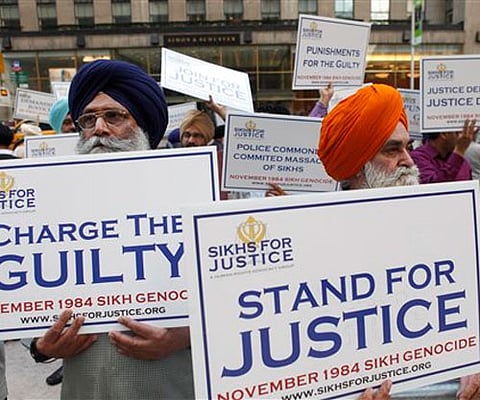 Sikh in New York protesting Minister Kamal Nath's alleged role in 1984 anti-Sikh riots. (Photo | AP)