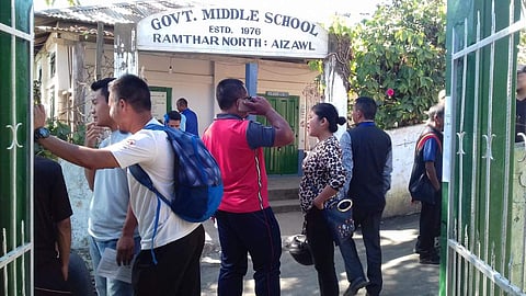 Voters wait to cast their ballot at a polling booth in Aizawl on Wednesday. (Photo | Special Arrangement)