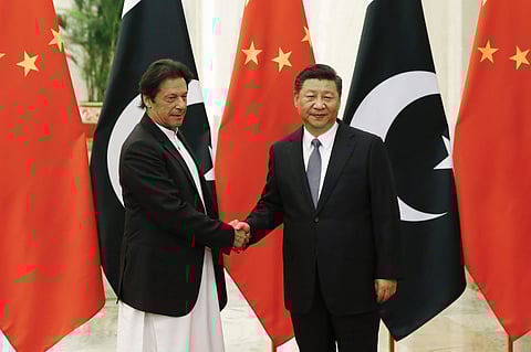Chinese President Xi Jinping met with visiting Pakistan Prime Minister Imran Khan in Beijing on Friday. (Photo | AP)