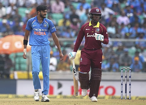 India's Khaleel Ahmed, left, reacts after bowling a delivery to West Indies' Shimron Hetmyer, right, during the fifth and last one-day international cricket match between India and West Indies in Thiruvananthapuram, India, Thursday, Nov. 1, 2018. | AP