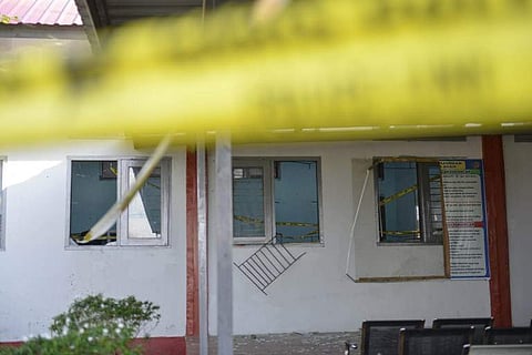 Broken windows are seen damaged at a prison where prisoners escaped in Banda Aceh on November 30, 2018. (Photo | AFP)