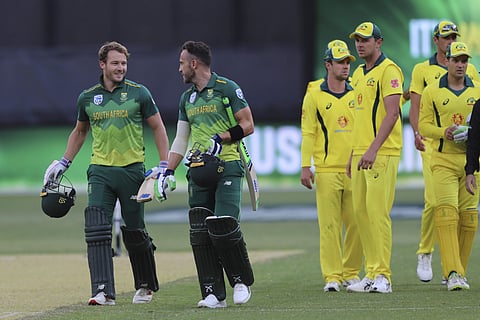 South Africa's David Miller (left) and Faf du Plessis, second left, leave the pitch after defeating Australia in their one-day international cricket match in Perth. (Photo | AP)