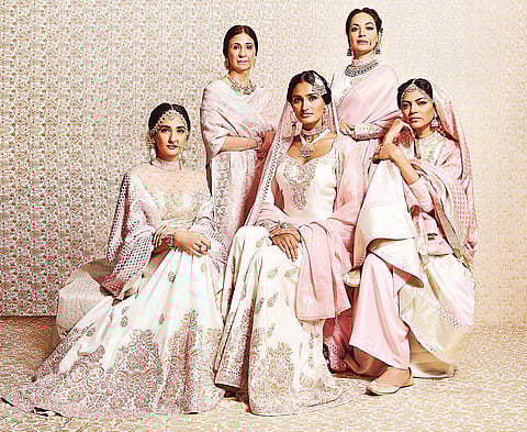 Leena Singh (standing, left)