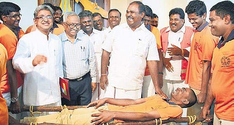 Minister R B Udhaya Kumar visiting an exhibition during the inauguration of Disaster Response Guards in the city on Saturday | DEBADATTA MALICK