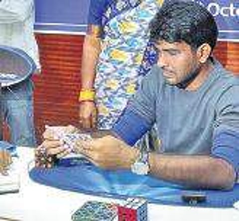 Bangalore boy becomes first Indian to set record in speed solving, unicycling