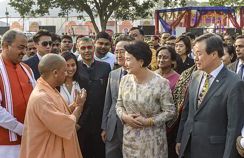 Uttar Pradesh Chief Minister Yogi Adityanath and South Korean first lady Kim Jung-sook on their arrival at the Queen Huh Park in Ayodhya Tuesday. November 6 2018. | PTI