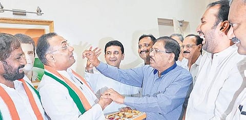 KPCC president Dinesh Gundu Rao, DyCM G Parameshwara and other Congress leaders celebrate the party’s victory in Bengaluru on Tuesday | KPN
