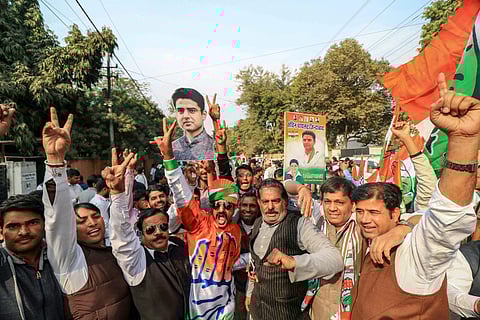 Congress workers and supporters celebrate the party's winning trend in the Rajasthan Assembly elections, at the party office in Jaipur. (Photo| PTI)