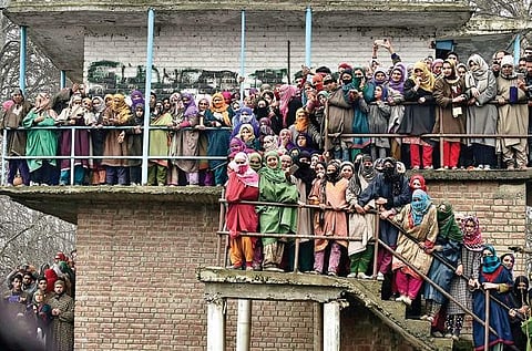 Women watch the funeral of Lashkar-e-Toiba militants Saqib Bilal Sheikh (17) and Mudasir Rashid Parray (14) in Kashmir on Monday| pti