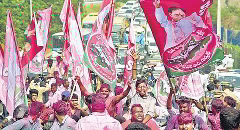 TRS supporters celebrate their party’s victory outside Telangana Bhavan in Hyderabad on Tuesday | R Satish BABU
