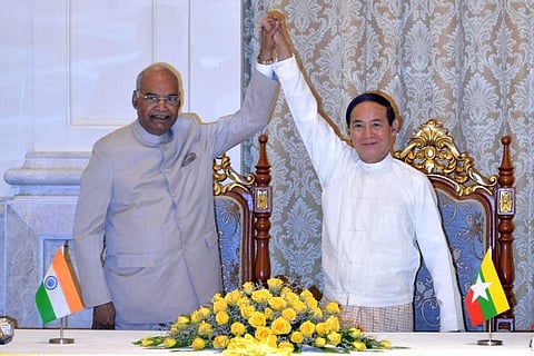 India's President Ram Nath Kovind (L) with his Myanmar counterpart Win Myint join hands at the presidential palace in capital Naypyidaw. (Photo|AFP)