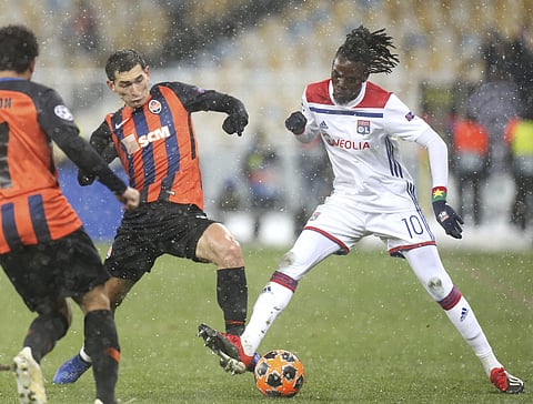 Shakhtar's Taras Stepanenko (L) challenges for the ball with Lyon's Bertrand Traore during the Group F Champions League match at the Olympiyskiy stadium, in Kiev, Ukraine (Photo | AP)