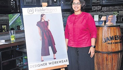 Founder Ayushi Gudwani with her designed dress