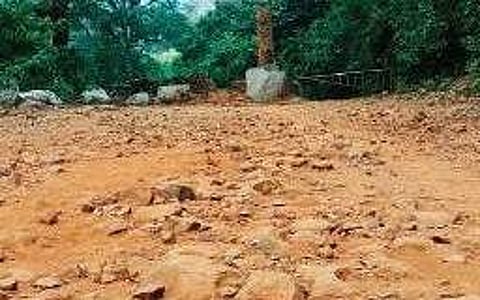 The dilapidated road leading to Devkund waterfall and Maa Ambika temple | Express