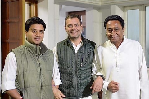 Congress chief Rahul Gandhi (in centre) with Jyotiradia Scindia on his left and Kamal Nath on his right. He used a Leo Tolstoy quote: 'The two most powerful warriors are patience and time.' (Photo | Rahul Gandhi/ Twitter)