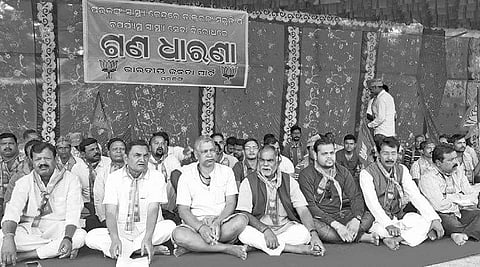 BJP activists staging protest at Parjang in Dhenkanal district on Friday | Express