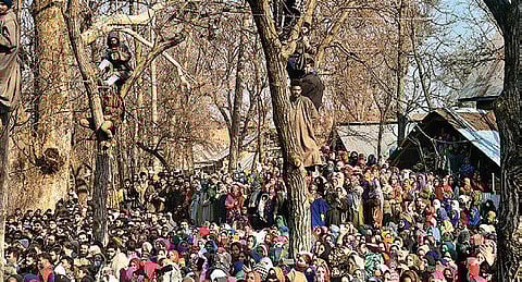 Locals gather for the funeral procession of the civilians killed during the encounter in south Kashmir’s Pulwama on Saturday | PTI