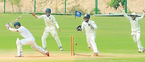 Delhi’s Shivam Sharma is bowled by Kerala’s Sijomon Joseph at the St Xavier’s ground in Thiruvananthapuram on Saturday