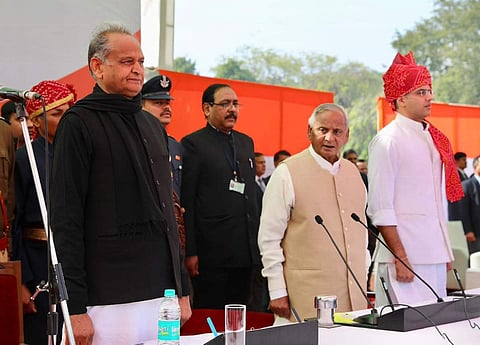 Rajasthan CM Ashok Gehlot (L), Governor Kalyan Singh (M) and deputy CM Sachin Pilot (R) at the swearing-in ceremony.(Photo| Twitter/Congress)