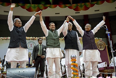 Congress President Rahul Gandhi 2nd L with newly sworn-in Chhattisgarh Chief Minister Bhupesh Baghel L cabinet ministers TS Singh Deo and Tamradhwaj Sahu R during the oath-taking ceremony in Raipur. (Photo | PTI)