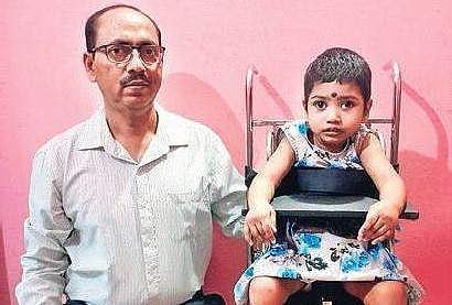 Subrata Kumar Haldar with a patient on the Postural Correction chair| Express