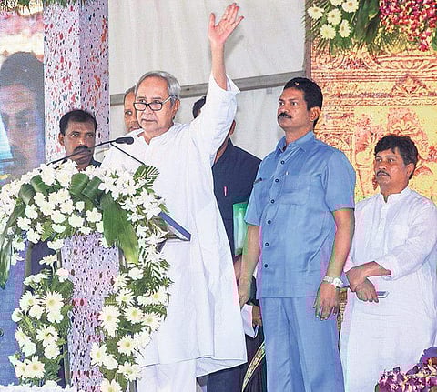Chief Minister Naveen Patnaik addressing a public gathering at Khalikote University stadium on Saturday | Express