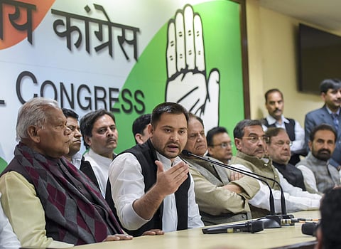 RJD's Tejashwi Yadav along with other Mahagathbandhan leaders speaks during a press conference at which RLSP leader Upendra Kushwaha joined the grand alliance at AICC in New Delhi. (Photo | PTI)