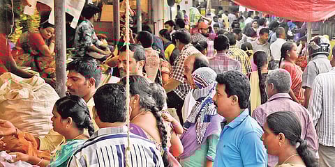 People buy vegetables at Swaraj Maidan Rythu Bazaar in city | P Ravindra Babu