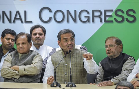 Rashtriya Lok Samta Party RLSP leader Upendra Kushwaha 3rd R speaks after joining the grand alliance during a press conference at AICC in New Delhi. (Photo | PTI)