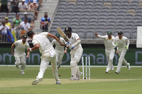 Indian opener Murali Vijay is bowled by Australia's Mitchell Starc during the second cricket test in Perth (Photo | AP)
