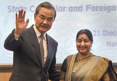 Union External Affairs Minister Sushma Swaraj and her Chinese counterpart Wang Yi during a joint press statement in New Delhi Friday Dec. 21 2018. | PTI