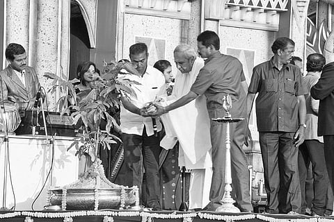 Chief Minister Naveen Patnaik watering a plant to mark inaugural ceremony of the festival | Express