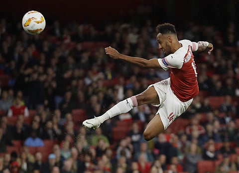Arsenal's Pierre-Emerick Aubameyang kicks the ball during the Europa League Group E match between Arsenal and Vorskla in London. (File Photo | AP)