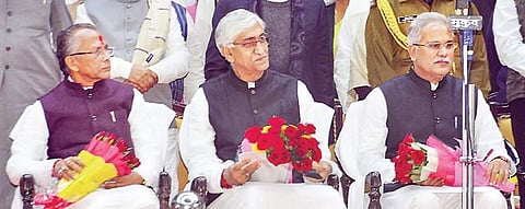 (L-R) Cabinet minister Tamradhwaj Sahu and TS Singh Deo with Chhattisgarh Chief Minister Bhupesh Baghel at their swearing in on December 17 | pTI