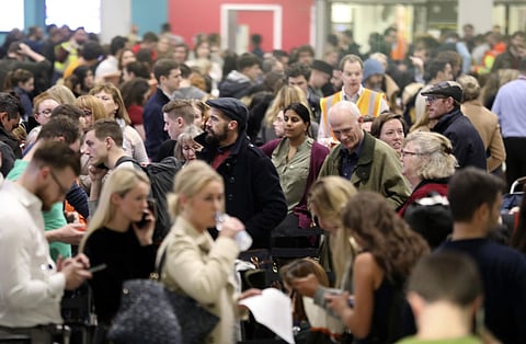 Passengers at Gatwick airport waiting for their flights following the delays and cancellations in London. (Photo|AP)