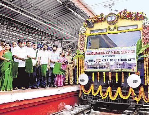 MP Pratap Simha flags off the MEMU train between Mysuru and Bengaluru city in Mysuru on Sunday | Udayashankar S