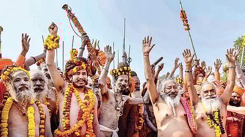 Naga sadhus of Panch Dashnam Juna Akhara take part in Peshvai, a procession on the banks of Ganga, ahead of the Kumbh Mela in Allahabad. (Photo | PTI)