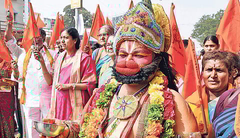 A devotee participating in Hanuman ‘Rath Yatra’ in city on Tuesday I R V K Rao