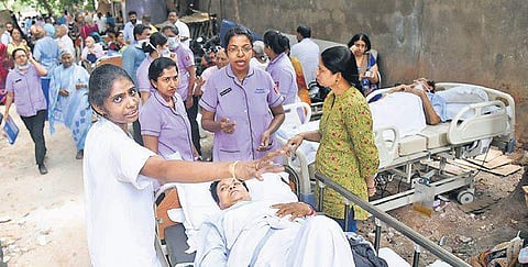 In this June, 2017 photo nurse Arul Beulah Jasmine is seen in action at Malathi Manipal Hospitals in JP Nagar. She led a team of 107 nurses and evacuated patients after a short-circuit caused smoke to emanate in the building | Vinod Kumar T