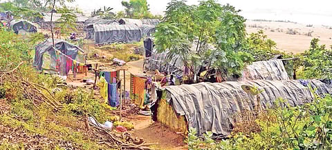 A slum on the banks of river Kathajodi in Cuttack district.
