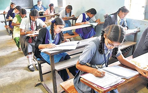 Students with digital watches will be told to take them off before entering the hall | Express