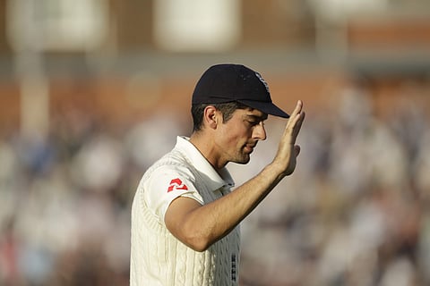 England's Alastair Cook, in his last ever match before retiring from test cricket, waves as he walks off at the end of the day's play during the fifth cricket test match of a five match series between England and India at the Oval cricket ground in London