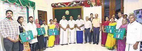 CM Edappadi K Palaniswami after giving away free saris and dhotis to families at the Secretariat | Express