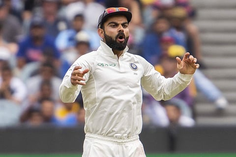 India's captain Virat Kohli reacts in the field during play on day four of the third cricket test between India and Australia in Melbourne. (Photo | AP)