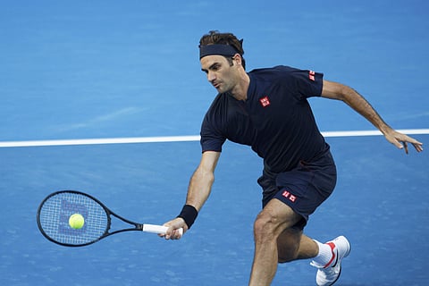 Switzerland's Roger Federer volleys during his match against Britain's Cameron Norrie at the Hopman Cup in Perth. (Photo | AP)