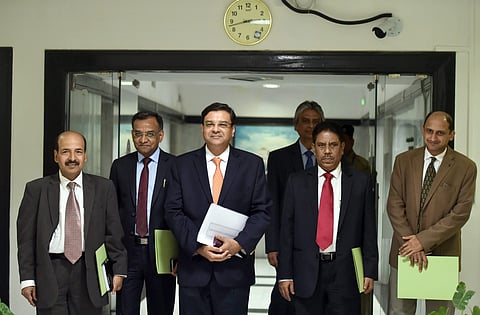 RBI Governor Urjit Patel C with deputy governors arrive for a post-monetary policy meeting press conference at RBI Headquarters in Mumbai Wednesday Dec. 5 2018. | PTI