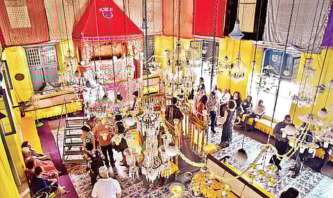 The synagogue looks resplendent with lights and decorations that reflect its heritage.