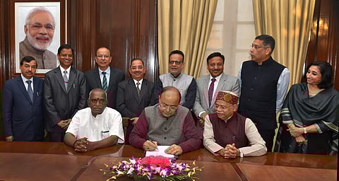 Union Finance Minister Arun Jaitley along with ministers of state Shiv Pratap Shukla Pon Radhakrishnan and his team of officials gives final touches to the Union Budget 2018-19 at his office at North Block in New Delhi on Wednesday. | PTI