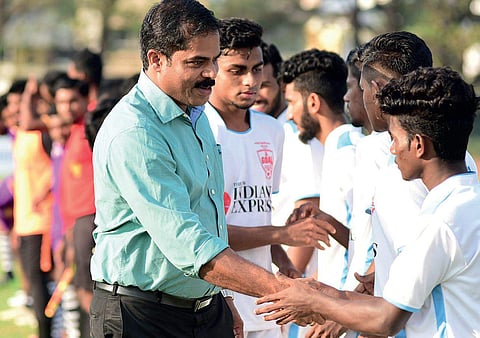 Kerala Football Association general secretary P Anilkumar greeting players and match officials on Wednesday | MELTON ANTONY